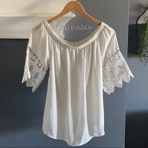 Sheek off-the-shoulder blouse